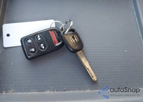 2010 Honda Odyssey Ex z USA, uszkodzony, nr VIN 5FNRL3H40AB066882